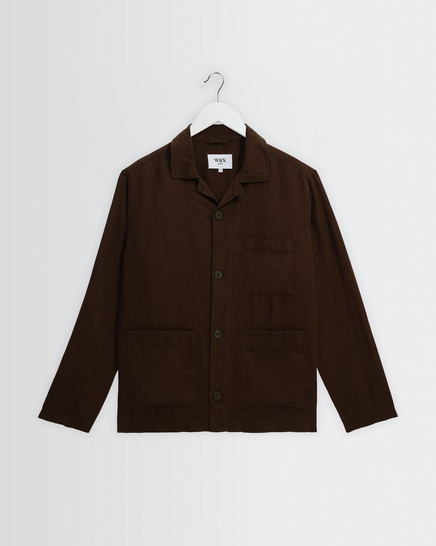 A brown washed-linen overshirt jacket — a warm-toned layer that anchors a fall capsule