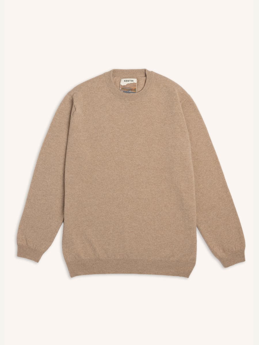 An oat merino-wool and cashmere crew-neck knit — a quality, quiet layer that ages well