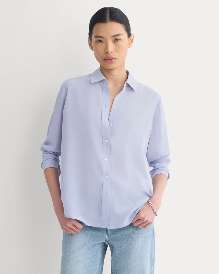 A pale-blue silk shirt — the refined, fewer-better register of a 40s capsule